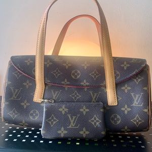 Authentic Louis Vuitton envelope purse with matching wallet